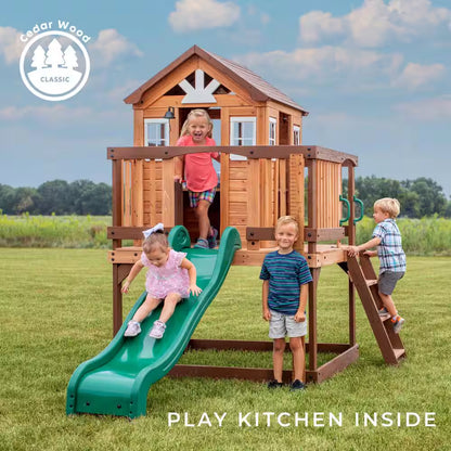 Echo Heights Indoor Outdoor All Cedar Wooden Elevated Playhouse with Clubhouse, Ladder, Green Slide, and Play Kitchen