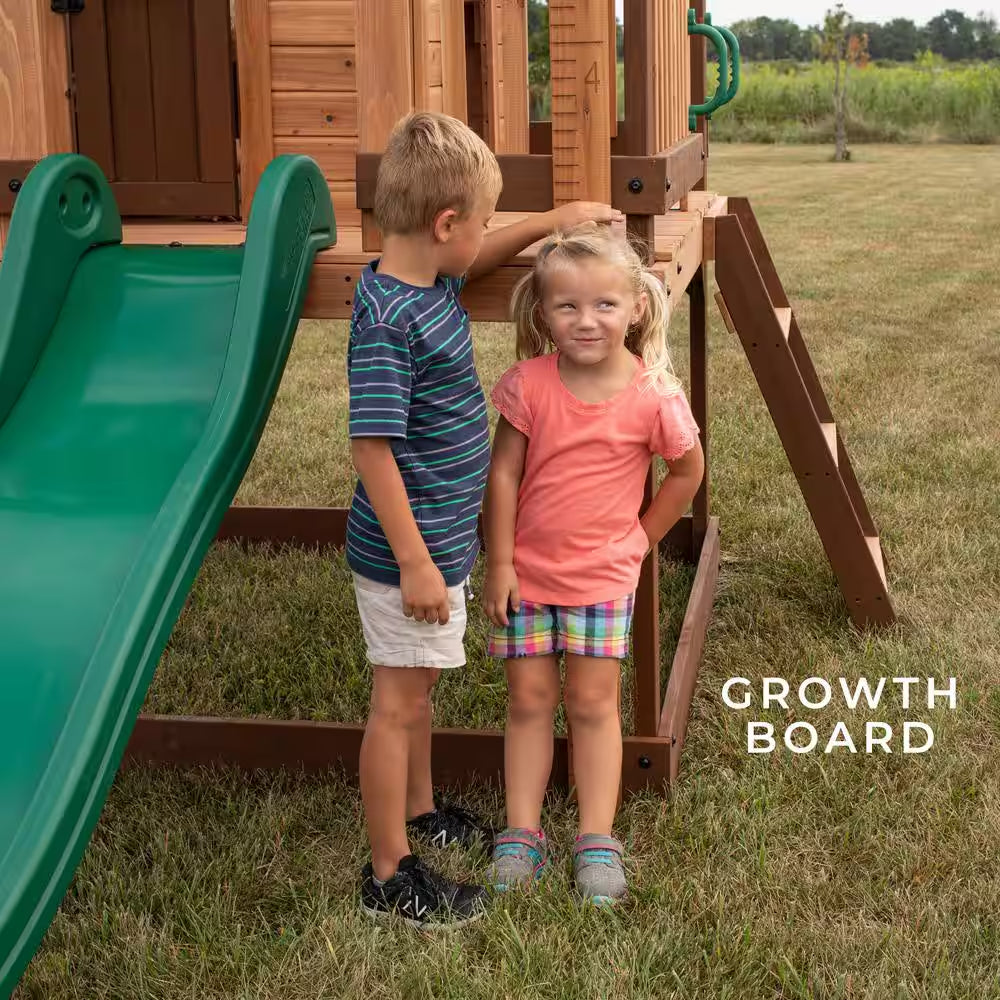 Echo Heights Indoor Outdoor All Cedar Wooden Elevated Playhouse with Clubhouse, Ladder, Green Slide, and Play Kitchen